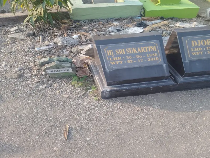 Hj. Sukartini
